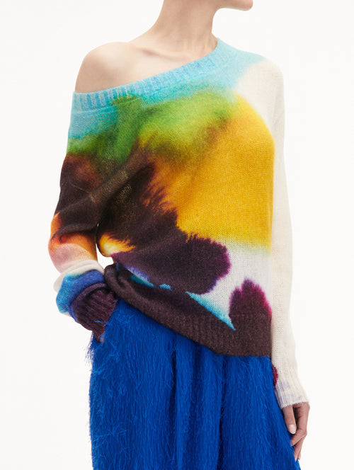 Abstract Watercolor Off-The-Shoulder Pullover Styled with Blue Pants Side View