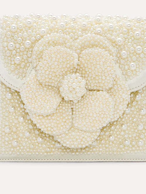 Pearl Embroidered Mini TRO Bag in White with detachable shoulder strap and flower motif at the clasp. Zoom View